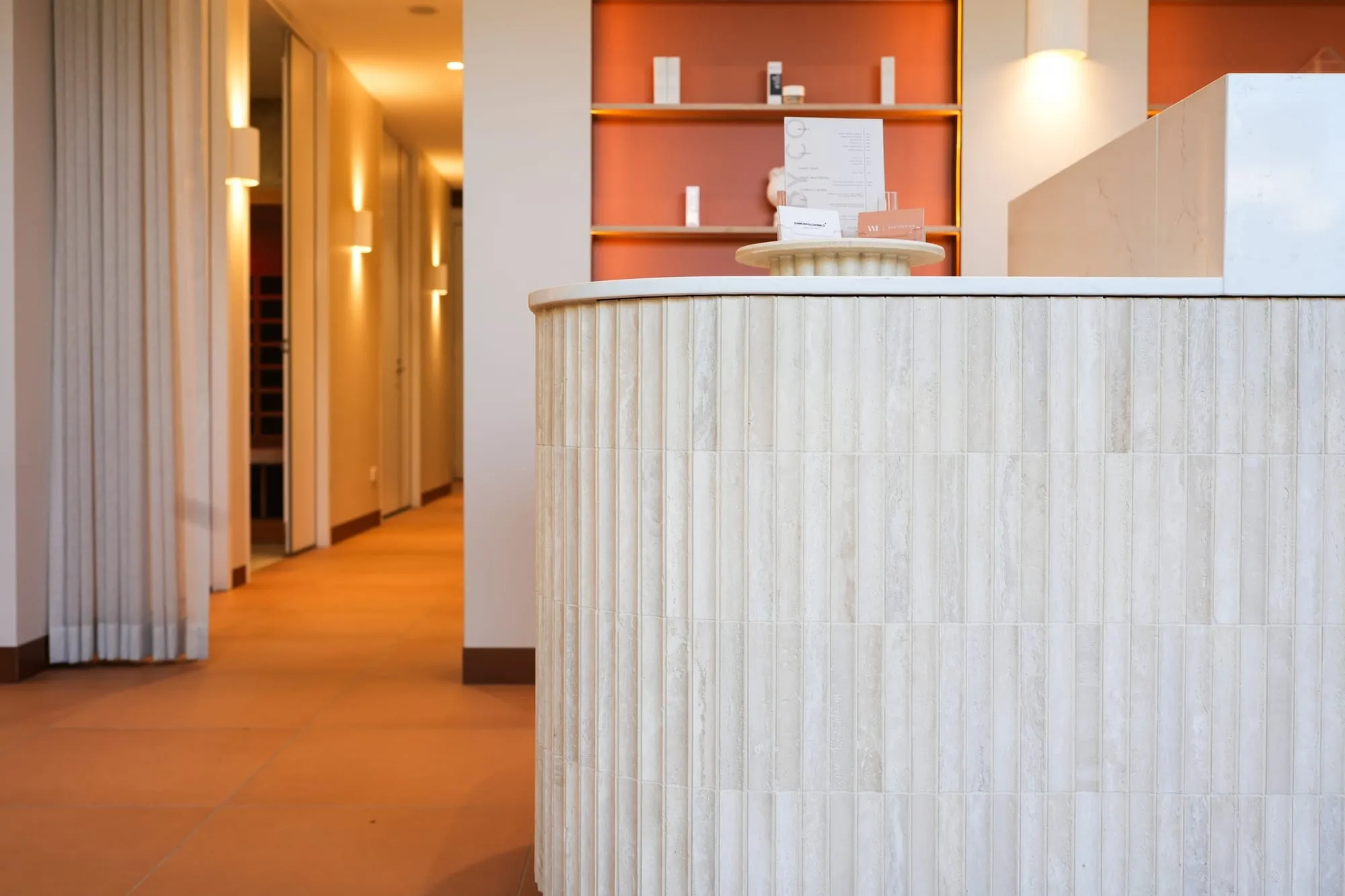 Curved fluted reception desk at Body Co, Oran Park