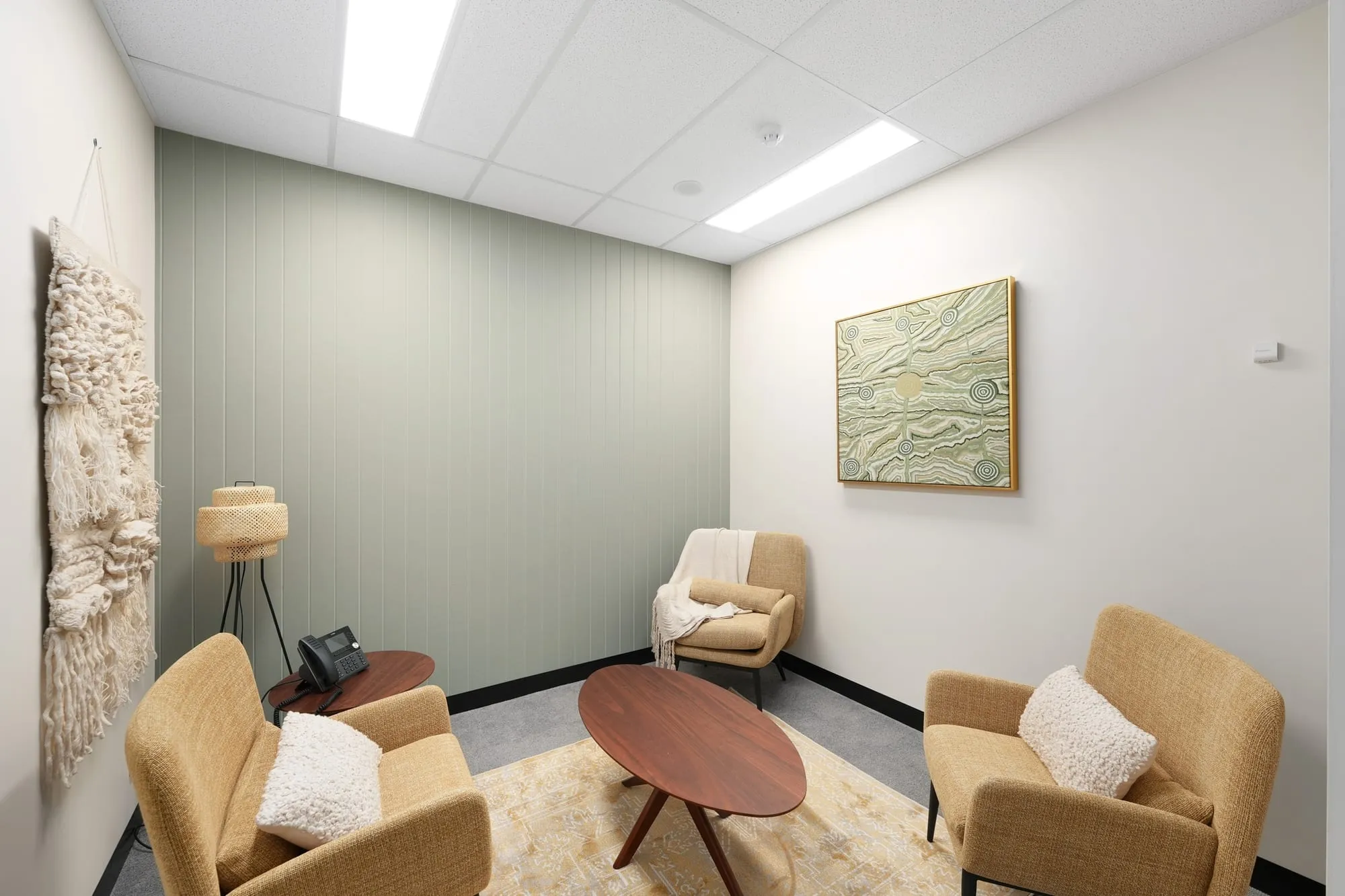 Consult room with soft lounge seating at Medicare Mental Health, Campbelltown