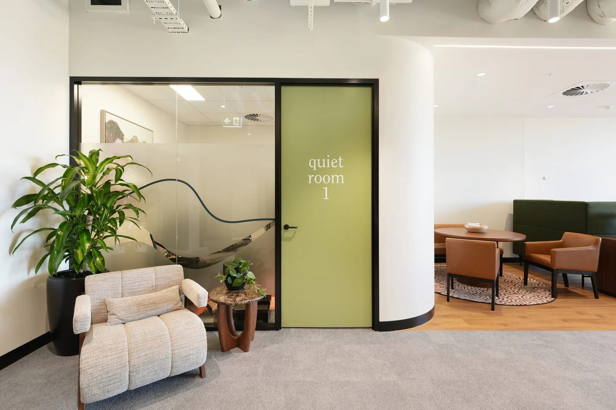 Quiet room with green door and soft seating at Medicare Mental Health, Campbelltown